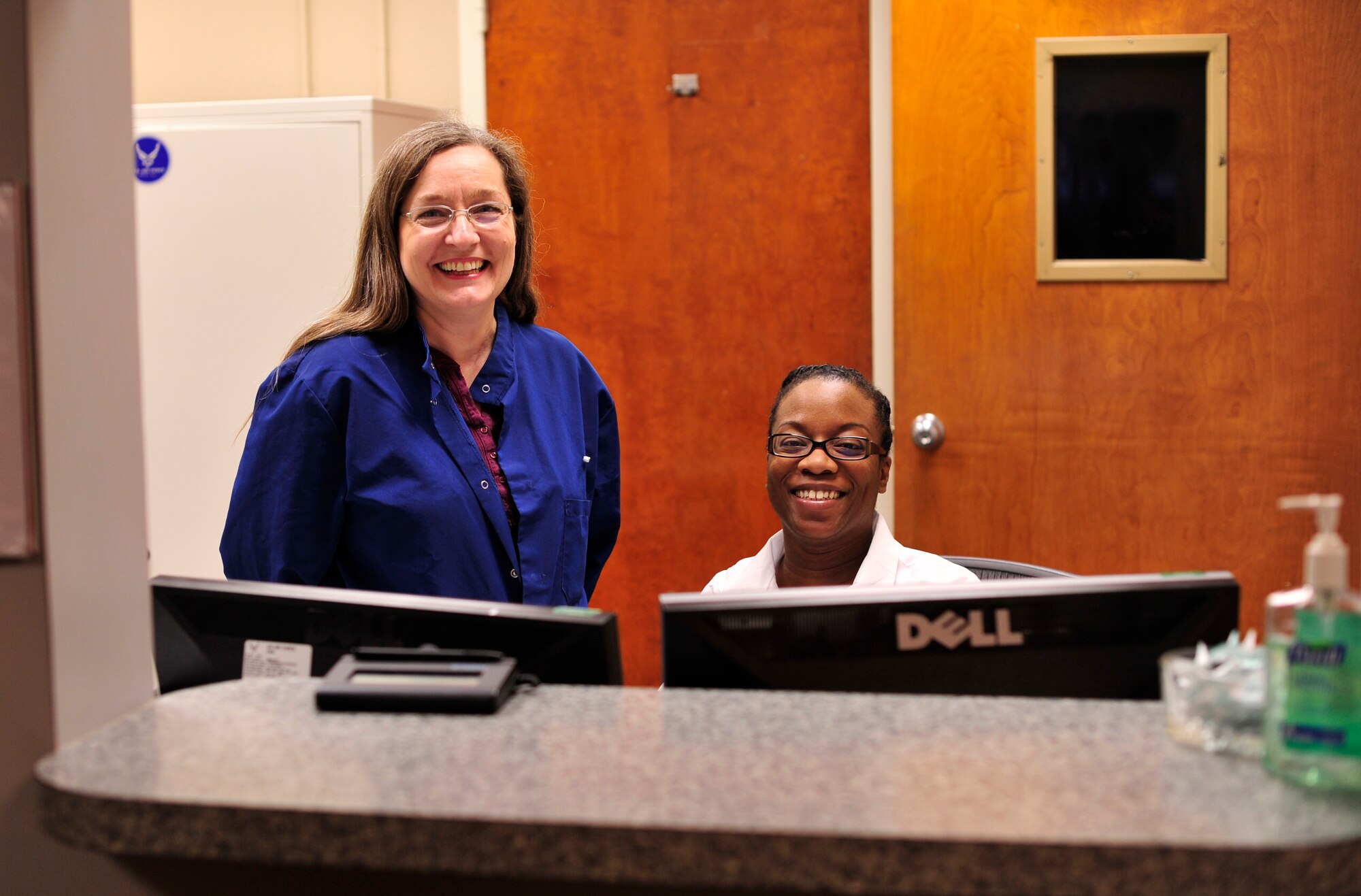 Ms. Tonia Fludd and Mrs. Terri Loh, 779th Medical Group medical technicians, greet and check-in patients Jan. 31, 2013 at Joint Base Andrews, Md. (U.S. Air Force photo/Airman 1st Class Erin O’Shea) 