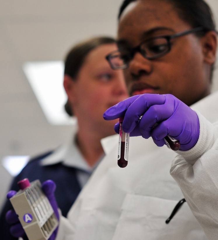 Airman 1st Class Reyna Lopez- Tegui, 779th Medical Group medical laboratory technician, holds a blood sample for a Complete Blood Count (CBC) test Jan. 31, 2013 at Joint Base Andrews, Md. The CBC test is used to evaluate one’s overall health and to detect a variety of disorders. (U.S. Air Force photo/ Airman 1st Class Erin O’Shea)     