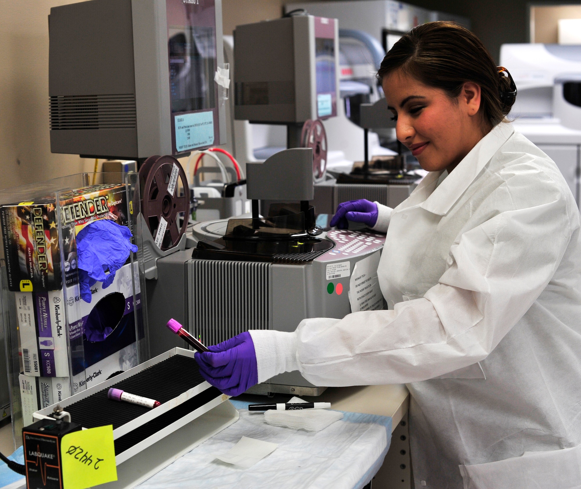 Airman 1st Class Sabrina Huerta, 779th Medical Group Medical laboratory technician, performs a Prothrombin Time/Partial Thromboplastin Time (PT/PTT) test Jan.31, 2013 at Joint Base Andrews, Md. This test measures how quickly a blood clot forms and is used to prevent heart attacks and blood clots. (U.S. Air Force photo/Airman 1st Class Erin O’Shea)                                           