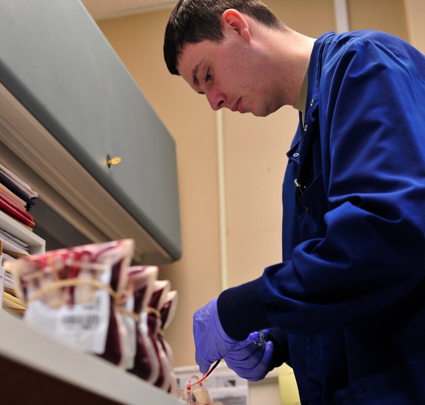 Airman 1st Class Daniel Philips, 779th Medical Group medical laboratory technician, prepares to perform a cross match on blood on Jan. 31, 2013 at Joint Base Andrews, Md. The cross-match is used to determine the possibility of a blood transfusion. The transfusions are used to replace lost blood during a surgery and supplement for patients who are not able to properly produce their own blood. (U.S. Air Force photo/Airman 1st Class Erin O’Shea)     