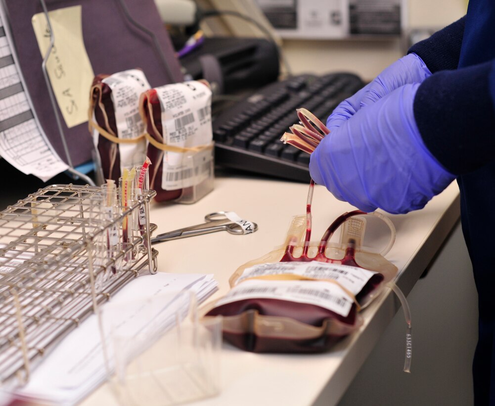 Airman 1st Class Daniel Phelps, 779th Medical Group medical laboratory technician, prepares to perform a cross match on blood on Jan. 31, 2013 at Joint Base Andrews, Md. The transfusions are used to replace lost blood during a surgery and supplement for patients who are not able to properly produce their own blood. (U.S. Air Force photo/Airman 1st Class Erin O’Shea)         
