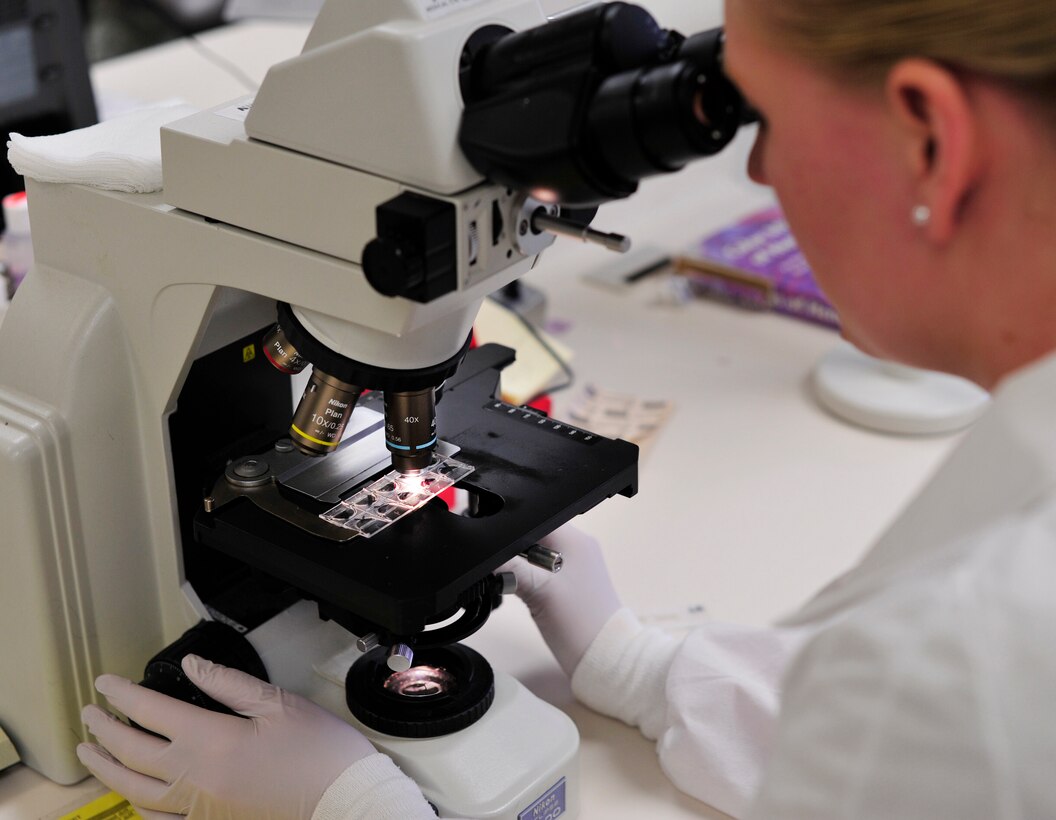 Airman 1st Class Tiffany Streeter, 779th Medical Group medical laboratory technician and Phase II student, performs a microscopic analysis on Jan. 31, 2013 at Joint base Andrews, Md. The analysis serves as a pictorial atlas for different types of common sediment findings in a single urinary sample. (U.S. Air Force photo/Airman 1st Class Erin O’Shea)              