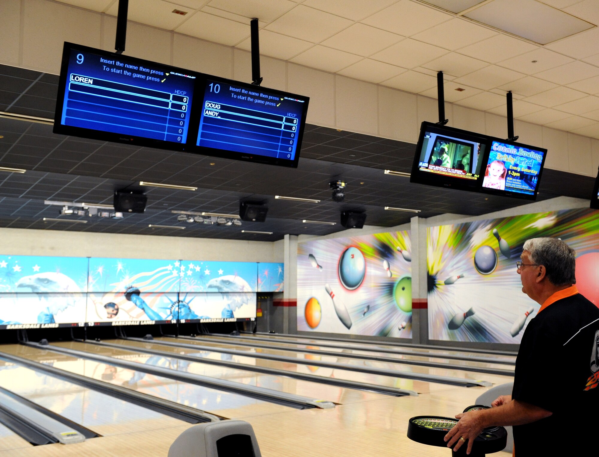 Doug Nurdin enters information into a computer at the Barksdale Lanes on Barksdale Air Force Base, La., Feb. 11. The Barksdale bowling center offers regular bowling games as well as leagues and tournaments. (U.S. Air Force photo/Airman 1st Class Benjamin Gonsier)
