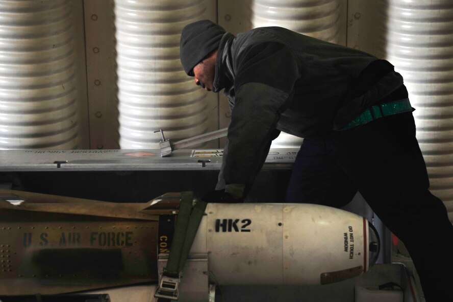 Senior Airman James Taylor, 25th Fighter Squadron weapons load crew member, prepares to transport an AGM-65 Maverick to load to an A-10 Thunderbolt II in preparation for operational readiness exercise Beverly Bulldog 13-02 at Osan Air Base, Republic of Korea, Feb. 8, 2013. The AGM-65 Maverick is a tactical, air-to-surface guided missile designed for close air support, interdiction and defense suppression mission. It provides stand-off capability and high probability of strike against a wide range of tactical targets, including armor, air defenses, ships, transportation equipment and fuel storage facilities. (U.S. Air Force photo/Airman 1st Class Alexis Siekert) 
