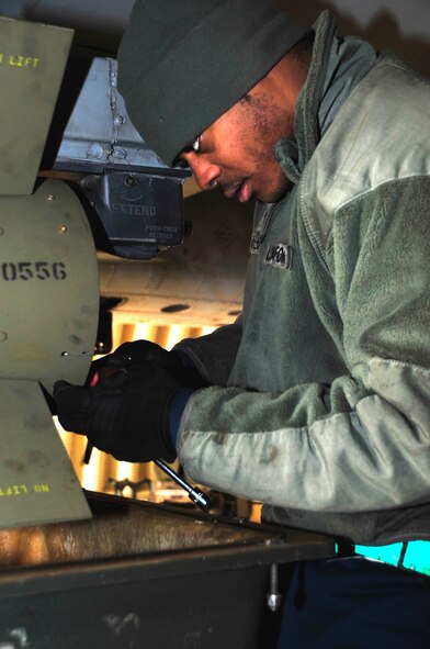 Senior Airman James Taylor, 25th Fighter Squadron weapons load crew member, connects an air-to-ground tactical missile known as an AGM-65 Maverick to an A-10 Thunderbolt II at Osan Air Base, Republic of Korea, Feb. 8, 2013. The load crew demonstrated their weapons loading capabilities in preparation for operational readiness exercise Beverly Bulldog 13-02. (U.S. Air Force photo/Airman 1st Class Alexis Siekert)