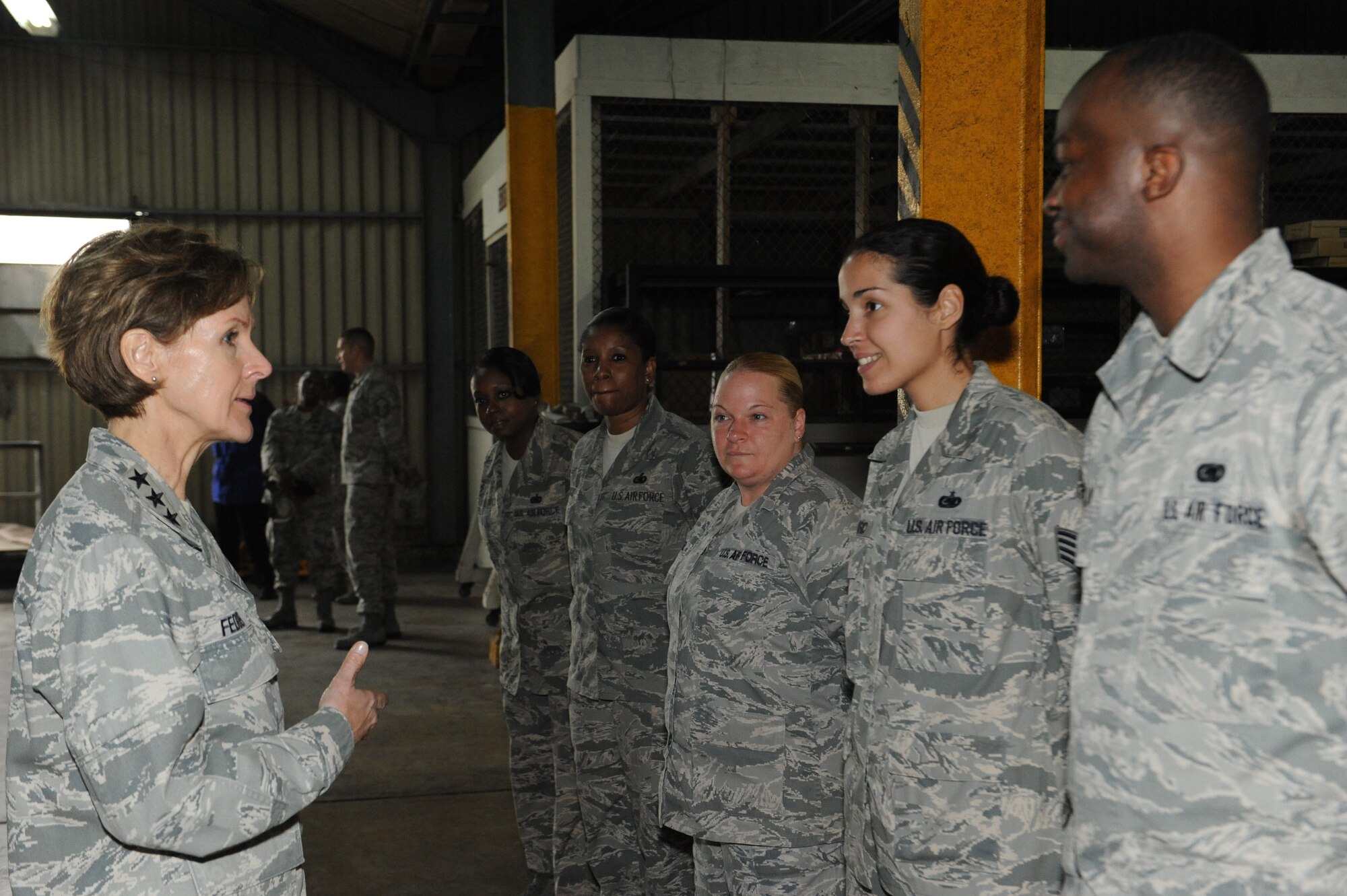 U.S. Air Force Lt. Gen. Judith Fedder, Deputy Chief of Staff for Logistics, Installations and Mission Support, Headquarters U.S. Air Force, Washington, D.C., talks to members from the 18th Logistics Readiness Squadron Transportation Management Office on Kadena Air Base, Japan, Feb. 11, 2013. During her tour of the base, Fedder also visited cryogenics, pass and ID, combat arms firing range, and received a forward area refueling point demonstration. (U.S. Air Force photo/Airman 1st Class Malia Jenkins)   