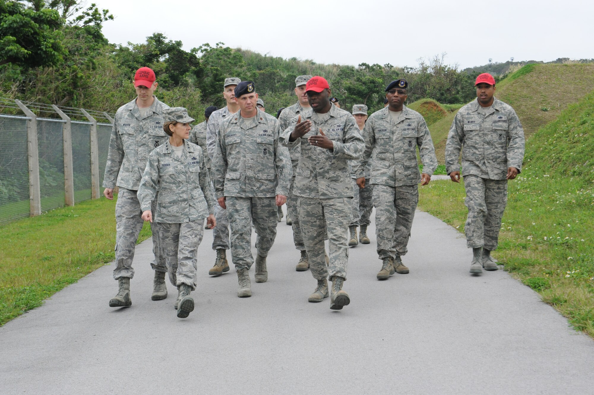 U.S. Air Force Tech. Sgt. Jahara Brown, 18th Security Forces Squadron NCO in charge of combat arms, briefs Lt. Gen. Judith Fedder, Deputy Chief of Staff for Logistics, Installations and Mission Support, Headquarters U.S. Air Force, Washington, D.C., and Brig. Gen. Allen Jamerson, Director of Security Forces, Deputy Chief of Staff for Logistics, Installations and Mission Support, Headquarters U.S. Air Force, Washington, D.C., on Kadena Air Base, Japan, Feb. 11, 2013. Fedder is responsible to the Chief of Staff for leadership, management and integration of Air Force logistics readiness, aircraft and missile maintenance, civil engineering and security forces, as well as setting policy and preparing budget estimates that reflect enhancements to productivity, combat readiness and quality of life for Air Force personnel.  (U.S. Air Force photo/Airman 1st Class Malia Jenkins)   