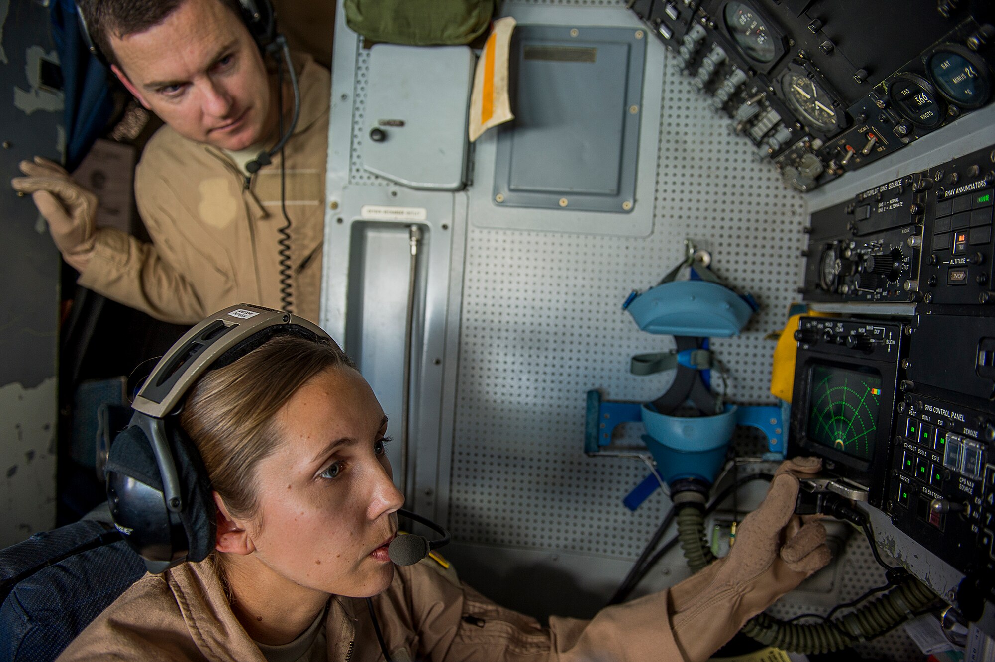 U.S. Air Force 1st Lt. Ashley Rowell, a navigator for the E-3 Sentry, Airborne Warning and Control System, from the 963rd Expeditionary Airborne Air Control Squadron, accomplishes a combat support mission over an undisclosed location, Southwest Asia, Jan. 30, 2013. The E-3 Sentry is an aircraft with an integrated command and control battle management, or C2BM, surveillance, target detection, and tracking platform. Rowell is from the 964th Airborne Air Control Squadron which is part of the 552d Air Control Wing at Tinker Air Force Base, Oklahoma. (U.S. Air Force photo/Tech. Sgt. Dennis J. Henry Jr.)