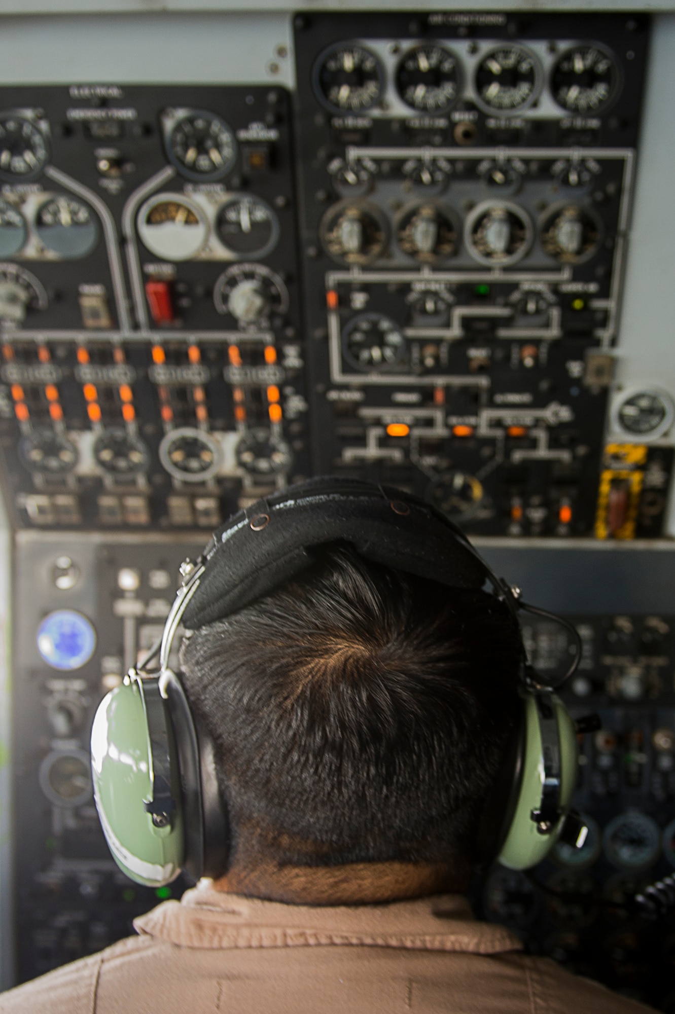 U.S. Air Force Tech. Sgt. Terry Green, an aircraft engineer for the E-3 Sentry, Airborne Warning and Control System, from the 963rd Expeditionary Airborne Air Control Squadron, accomplishes a combat support mission over an undisclosed location, Southwest Asia, Jan. 30, 2013. The E-3 Sentry is an aircraft with an integrated command and control battle management, or C2BM, surveillance, target detection, and tracking platform. Green is from the 964th Airborne Air Control Squadron which is part of the 552d Air Control Wing at Tinker Air Force Base, Oklahoma. (U.S. Air Force photo/Tech. Sgt. Dennis J. Henry Jr.)