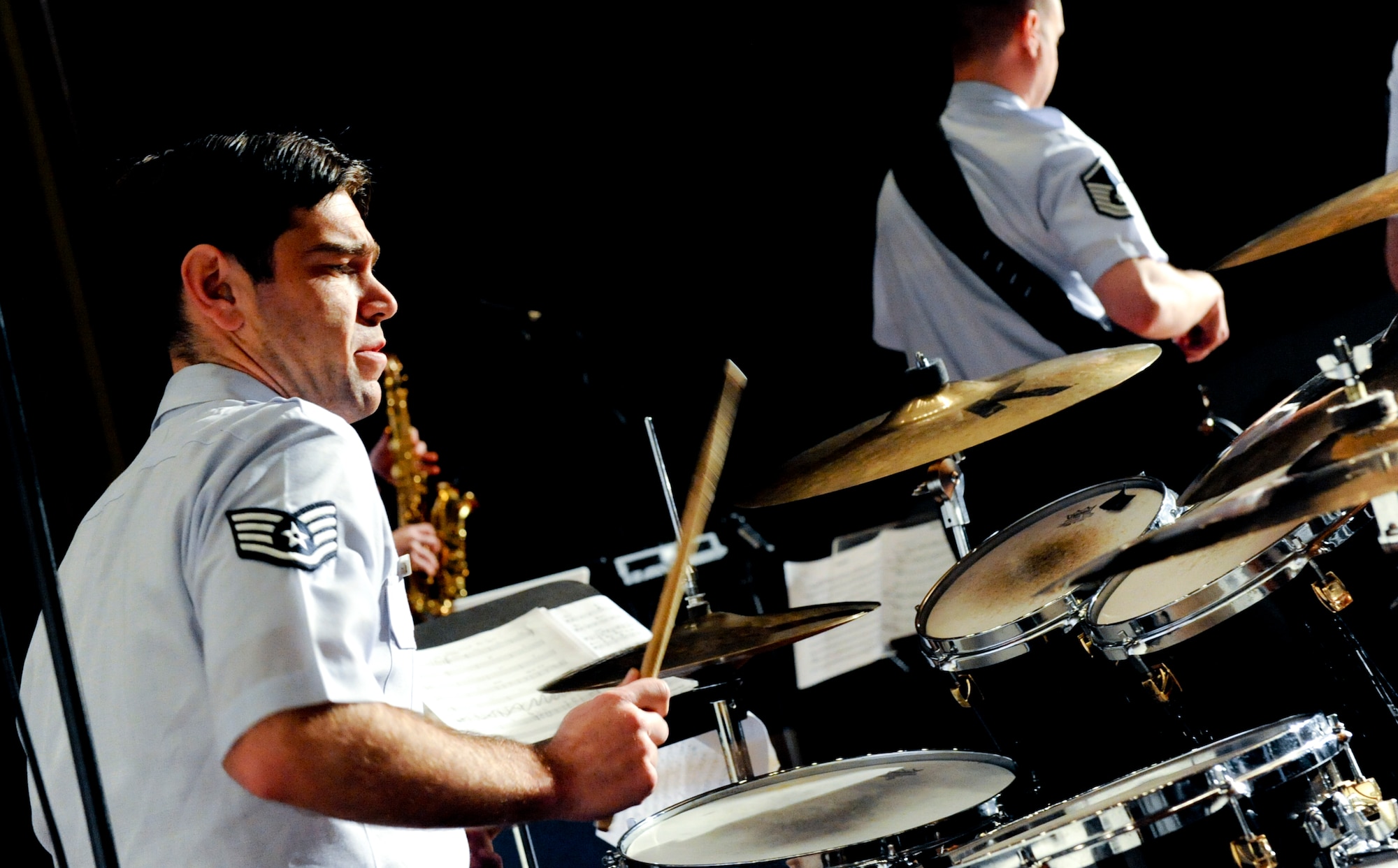 U.S. Air Force Staff Sgt. Steve Helfand, Pacific Air Forces band drummer, plays the drums during a performance at the Keystone Theater on Kadena Air Base, Japan, Feb. 7, 2013. The show was performed for more than 800 students from local military base schools. (U.S. Air Force photo/Airman 1st Class Brooke P. Doyle)