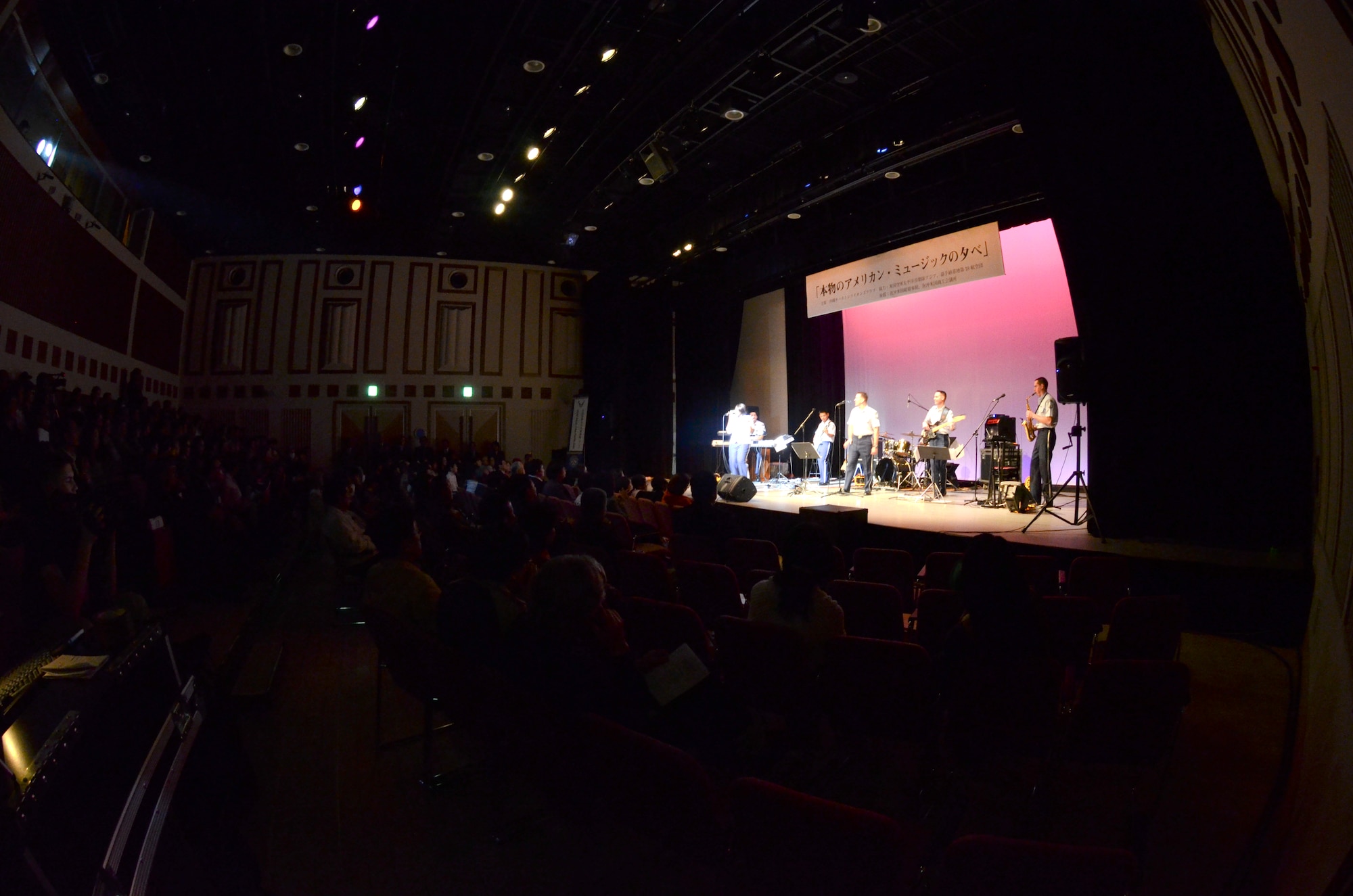 The Pacific Air Forces band, Pacific Trends, performs in Tenbus-kan Hall in Naha, Okinawa, Japan, Feb. 6, 2013. The band traveled around Okinawa performing hit songs from the 80s to today. (U.S. Air Force photo/Airman 1st Class Brooke P. Doyle)