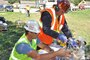 Contractor employees work at Nike C-32 Missile Site to investigate soil samples. 