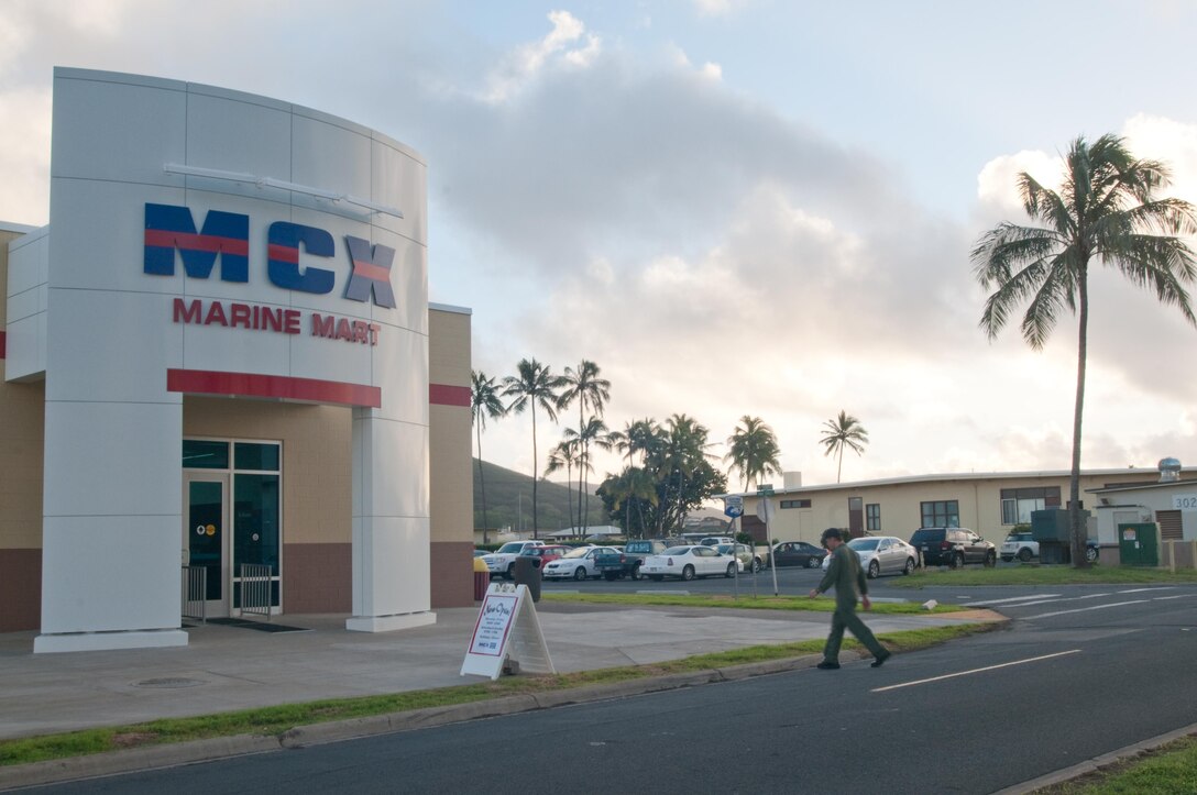 MARINE CORPS BASE HAWAII - A customer crosses 1st Street en route to the new Marine Mart which opened Feb. 4, 2013. The new store replaced two smaller convenience stores in the area and is open daily. (Official U.S. Marine Corps photo by Christine Cabalo)


