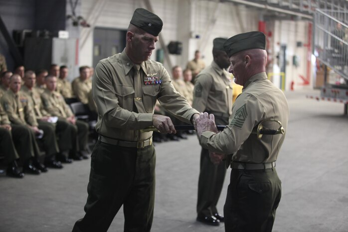 Sgt. Maj. Kenneth Redemacher receives the sword of office from Lt. Col. Richard F. Neitzey, commanding officer of Marine Heavy Helicopter Training Squadron 302 in a relief and appointment ceremony, Feb. 8. Redemacher replaced Sgt. Maj. Johnny L. Higdon Jr. 