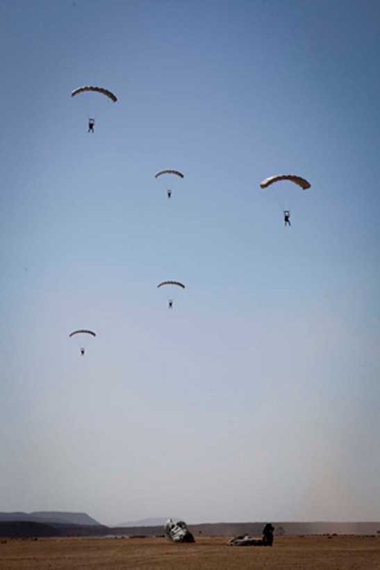 Marines from Force Reconnaissance Platoon, 15th Marine Expeditionary Unit, conducted an 8,000-foot free fall jump, Feb. 8.  The 15th MEU is deployed as part of the Peleliu Amphibious Ready Group as a U.S. Central Command theater reserve force, providing support for maritime security operations and theater security cooperation efforts in the U.S. 5th Fleet area of responsibility. (U.S. Marine Corps photo by: Master Sgt John A. Lee, II. / Released)