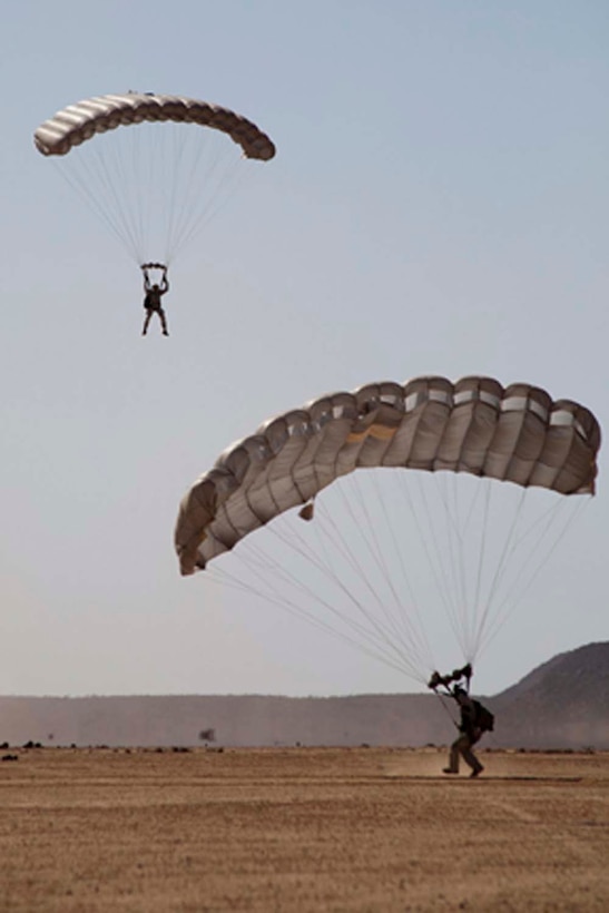 Marines from Force Reconnaissance Platoon, 15th Marine Expeditionary Unit, conducted an 8,000-foot free fall jump, Feb. 8.  The 15th MEU is deployed as part of the Peleliu Amphibious Ready Group as a U.S. Central Command theater reserve force, providing support for maritime security operations and theater security cooperation efforts in the U.S. 5th Fleet area of responsibility. (U.S. Marine Corps photo by: Master Sgt John A. Lee, II. / Released)