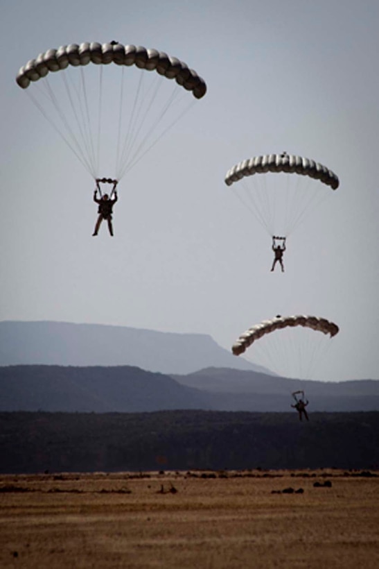 Marines from Force Reconnaissance Platoon, 15th Marine Expeditionary Unit, conduct an 8,000-foot freefall jump as part of a training sustainment package,  Feb. 8.  The 15th MEU is deployed as part of the Peleliu Amphibious Ready Group as a U.S. Central Command theater reserve force, providing support for maritime security operations and theater security cooperation efforts in the U.S. 5th Fleet area of responsibility. (U.S. Marine Corps photo by Master Sgt. John A. Lee, II/Released)