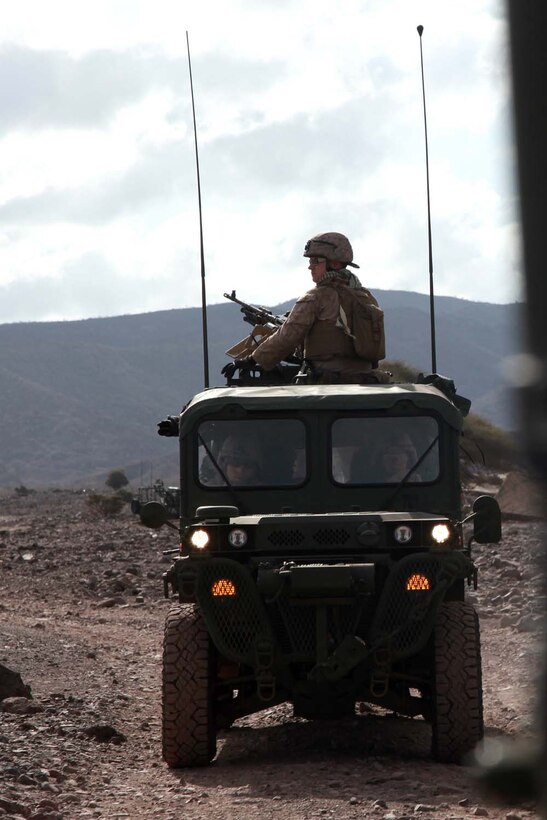 A light strike vehicle carrying Marines with Weapons Platoon, Kilo Company, Battalion Landing Team 3/5, 15th Marine Expeditionary Unit, convoys during unit sustainment training, Feb. 11. The platoon practiced working with the unitâ€™s light strike vehicles, or LSVs, to increase unit cohesion, practice the fundamentals of their trades, and take advantage of a unique opportunity to train in a foreign country. The 15th MEU is deployed as part of the Peleliu Amphibious Ready Group as a U.S. Central Command theater reserve force, providing support for maritime security operations and theater security cooperation efforts in the U.S. 5th Fleet area of responsibility.  (U.S. Marine Corps photo by Cpl. John Robbart III/Released)