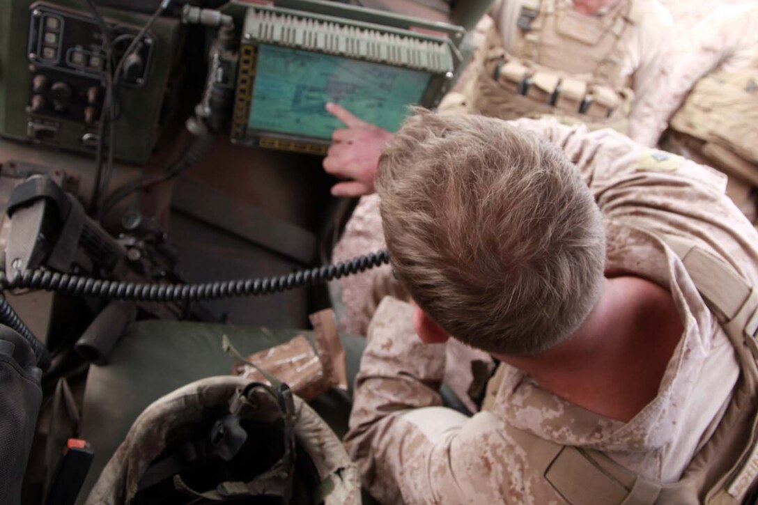 Sergeant Tyler W. Johnson, assault section leader, Weapons Platoon, Kilo Company, Battalion Landing Team 3/5, 15th Marine Expeditionary Unit, conducts a radio check in a light strike vehicle during unit sustainment training, Feb. 11. The platoon practiced working with the unitâ€™s light strike vehicles, or LSVs, to increase unit cohesion, practice the fundamentals of their trades, and take advantage of a unique opportunity to train in a foreign country. The 15th MEU is deployed as part of the Peleliu Amphibious Ready Group as a U.S. Central Command theater reserve force, providing support for maritime security operations and theater security cooperation efforts in the U.S. 5th Fleet area of responsibility.  (U.S. Marine Corps photo by Cpl. John Robbart III/Released)