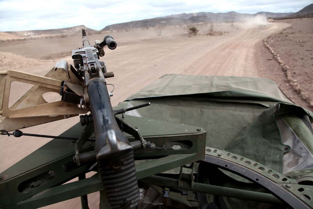 A light strike vehicle carrying Marines with Weapons Platoon, Kilo Company, Battalion Landing Team 3/5, 15th Marine Expeditionary Unit, convoys during unit sustainment training, Feb. 11. The platoon practiced working with the unitâ€™s light strike vehicles, or LSVs, to increase unit cohesion, practice the fundamentals of their trades, and take advantage of a unique opportunity to train in a foreign country. The 15th MEU is deployed as part of the Peleliu Amphibious Ready Group as a U.S. Central Command theater reserve force, providing support for maritime security operations and theater security cooperation efforts in the U.S. 5th Fleet area of responsibility. (U.S. Marine Corps photo by Cpl. John Robbart III/Released)
