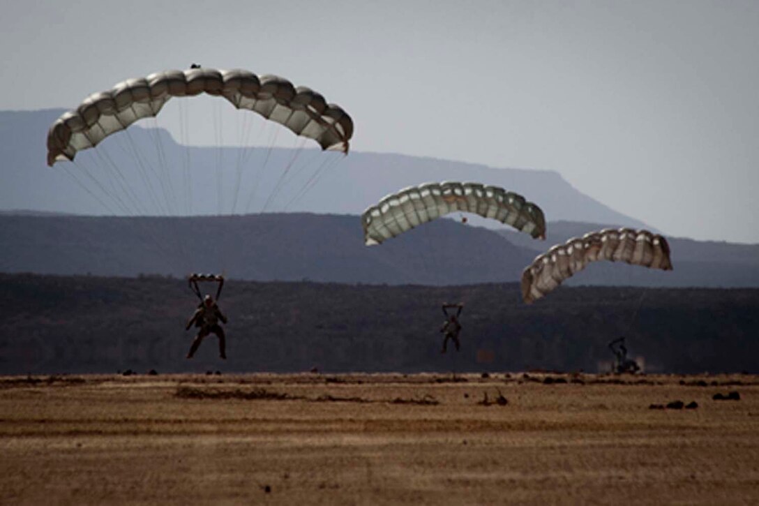 Marines from Force Reconnaissance Platoon, 15th Marine Expeditionary Unit, conduct an 8,000-foot freefall jump as part of a training sustainment package,  Feb. 8.  The 15th MEU is deployed as part of the Peleliu Amphibious Ready Group as a U.S. Central Command theater reserve force, providing support for maritime security operations and theater security cooperation efforts in the U.S. 5th Fleet area of responsibility. (U.S. Marine Corps photo by Master Sgt. John A. Lee, II/Released)