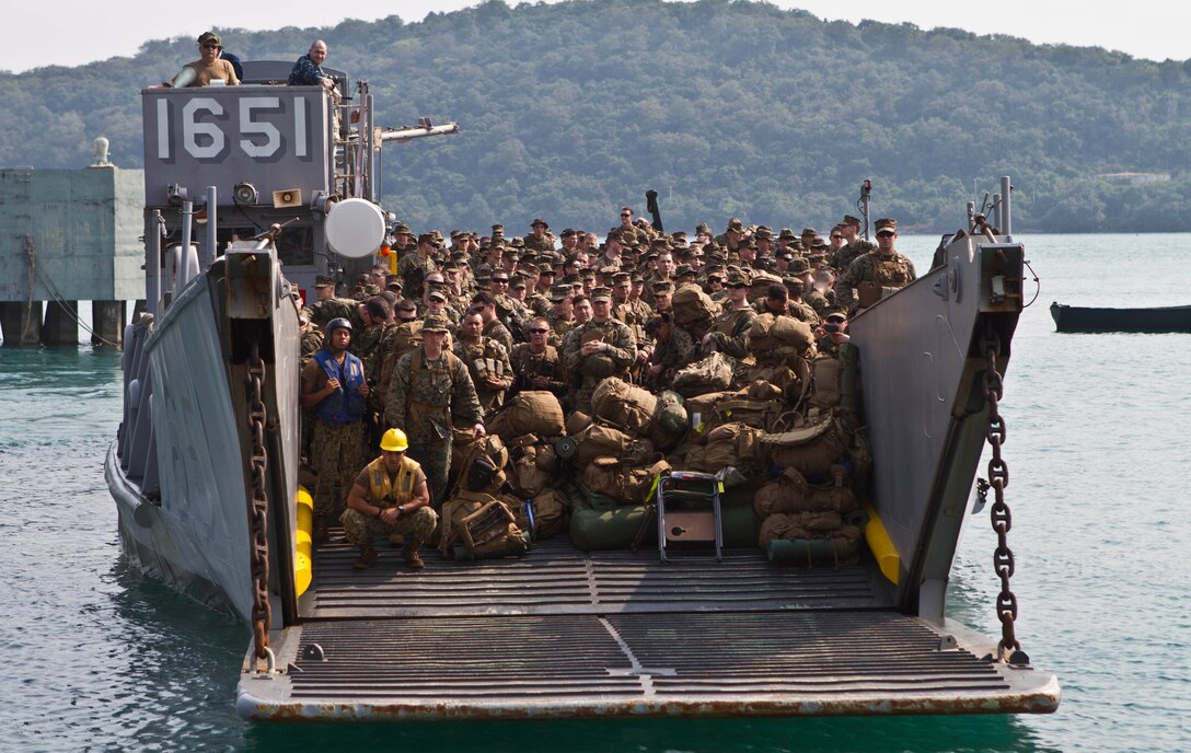 Marines and Sailors from the 31st Marine Expeditionary Unit prepare to offload from a landing craft utility of Amphibious Squadron 11 during their arrival to exercise Cobra Gold 2013 here, Feb. 12. Exercise Cobra Gold is an annual event that includes numerous multilateral exercises ranging from amphibious assaults to non-combatant evacuations. The training aims to improve interoperability between the United States, Kingdom of Thailand, and many other participating countries. The 31st MEU is the only continuously forward-deployed MEU and is the Marine Corps’ force in readiness in the Asia-Pacific region.