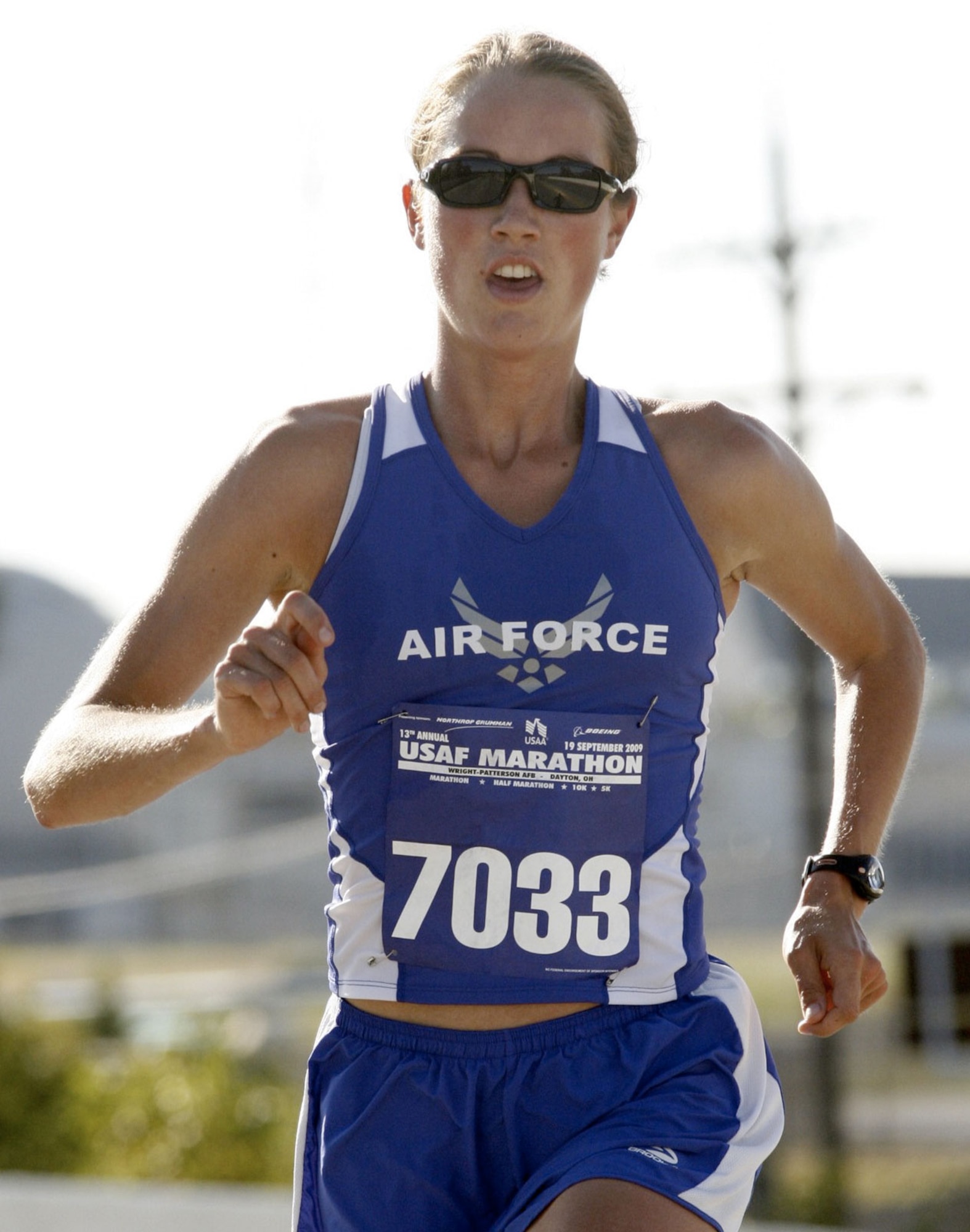 Air Force Capt. Caroline White, a C-17 Globemaster III pilot at JBER, competes in the 2009 Air Force Marathon. White represented the Air Force in the Olympic trials and won Pacific Air Forces’ 2012 Female Athlete of the Year title. She balances flying and running, often racking up more than 100 miles a week. (Courtesy photo)
