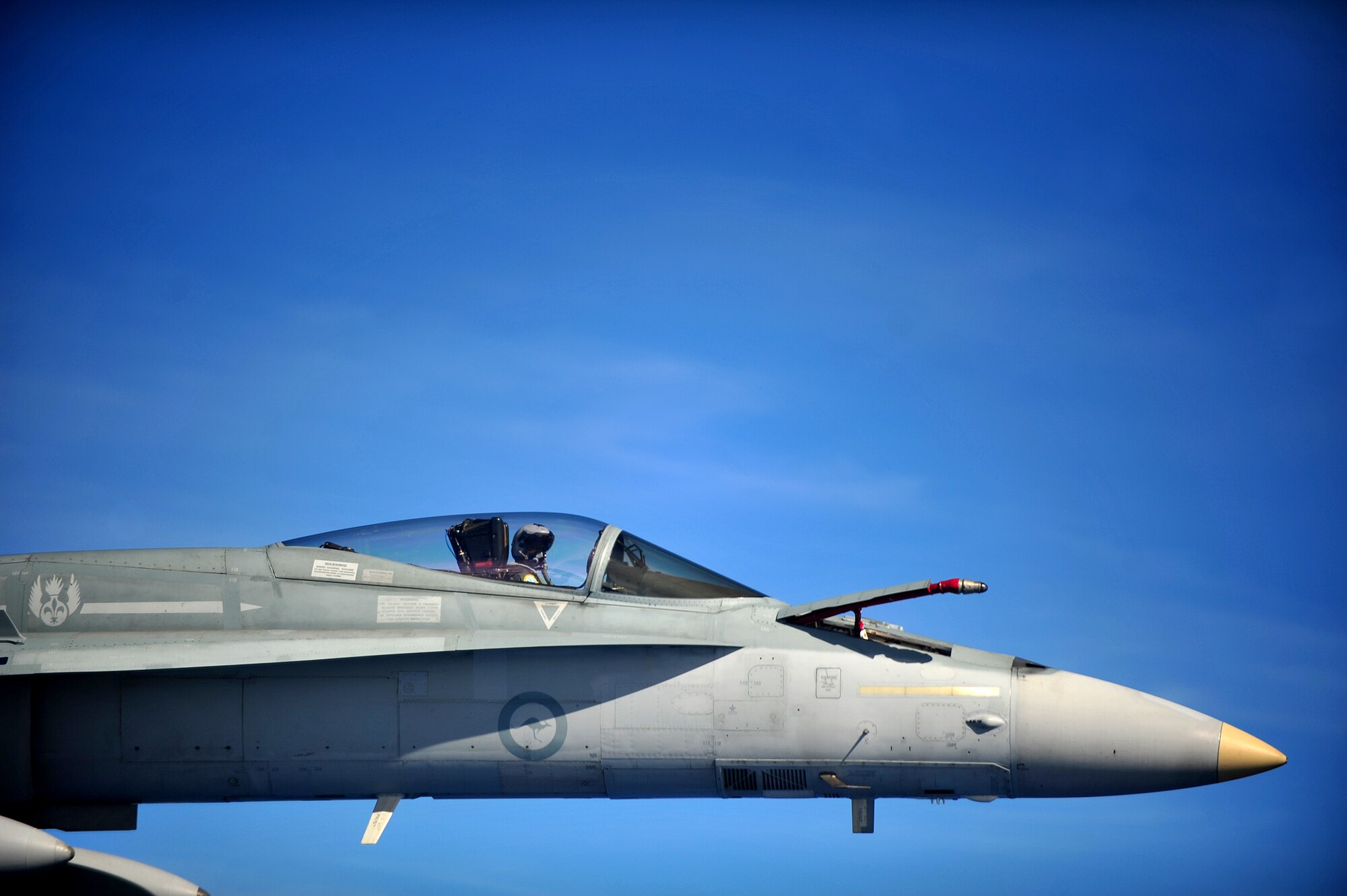 A Royal Australian Air Force F/A-18 Hornet prepares to conduct an air refuel while participating in Cope North 13 near Anderson Air Force Base, Guam, Feb. 13, 2013. The F/A-18 Hornet is a multi-role fighter designed for both air-to-air and air-to-ground missions. Cope North is an annual air combat tactics, humanitarian assistance and disaster relief exercise designed to increase the readiness and interoperability of the 
U.S. Air Force, Japan Air Self-Defense Force and Royal Australian Air Force.. (U.S. Air Force photo by Senior Airman Matthew Bruch/Released)
