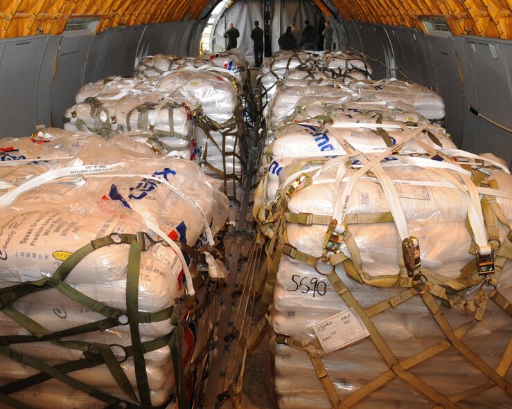 Several pallets of rice sit in a KC-10 Extender on the flightline at Barksdale Air Force Base, La., Feb. 13. The KC-10, assigned to Joint Base McGuire-Dix-Lakehurst, N.J., is here in support of the Denton Movement. The movement involved transporting 42,000 pounds of rice, donated by the Children's Lifeline Foundation, to Port au Prince, Haiti. (U.S. Air Force photo/Senior Airman Sean Martin)