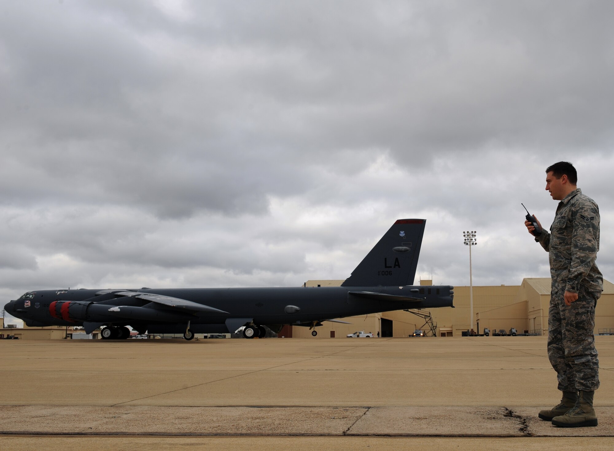 Airman 1st Class Andrew Henggeler, 2nd Operations Support Squadron airfield management, communicates with the air traffic tower about current airfield status on Barksdale Air Force Base, La., Feb. 13. Airfield management ensures safe operations of aircraft, personnel and vehicles on the airfield. (U.S. Air Force photo/Airman 1st Class Benjamin Gonsier)
