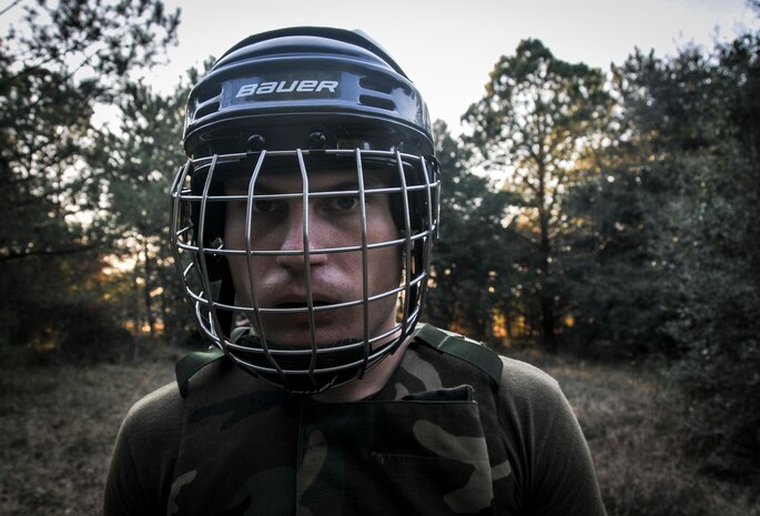 U.S. Marine Corps Pfc. Trae Neumann, a Naval Consolidated Brig Charleston corrections specialist, mentally prepares before a fight during Marine Corps Martial Arts Program training Feb. 7, 2013, at Joint Base Charleston – Weapons Station, S.C. MCMAP is a hand-to-hand, close quarter combat and weapons training program designed to educate, improve technique and boost morale throughout the Corps. Marines stationed at the NCBC participate in MCMAP four times a week. (U. S. Air Force photo/Airman 1st Class Jared Trimarchi) 