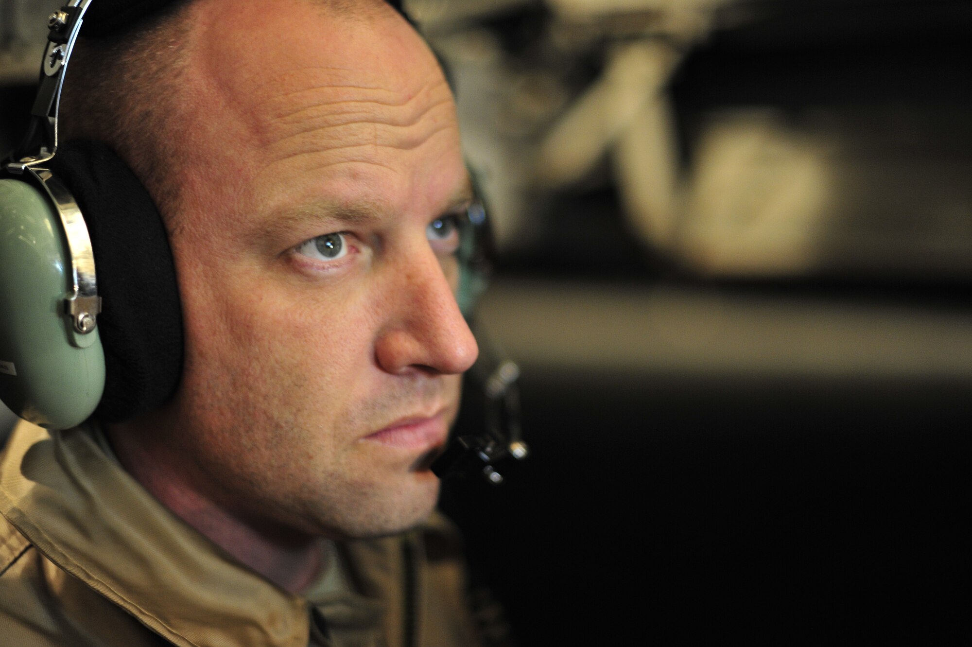U.S. Air Force Tech. Sgt. Jean Piersall, a C-5M Super Galaxy flight engineer with the 436th Airlift Wing at Dover Air Force Base, Del., inspects a C-5M's nose landing gear Jan. 26, 2013, at Camp Marmal, Afghanistan. The aircraft was forward deployed to support the scheduled rotation of two U.S. Army aviation task forces. (U.S. Air Force photo by Tech Sgt. Parker Gyokeres/Released)