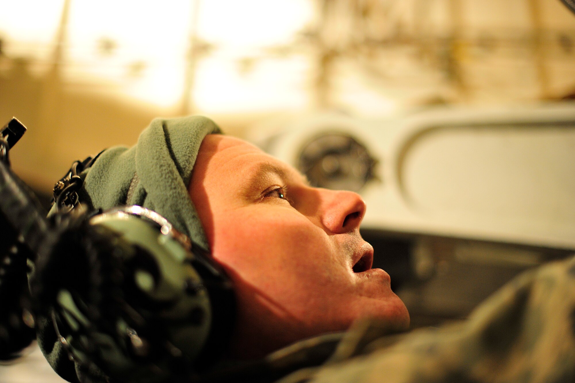 U.S. Air Force Master Sgt. Justin Jones, an aircraft production superintendent with the 436th Airlift Wing at Dover Air Force Base, Del., disconnects the nose landing gear steering linkage on a C-5M Super Galaxy aircraft before using a tug to push the aircraft into its parking spot Jan. 26, 2013, at Camp Marmal, Afghanistan. The aircraft was forward deployed to support the scheduled rotation of two U.S. Army aviation task forces. (U.S. Air Force photo by Tech Sgt. Parker Gyokeres/Released)