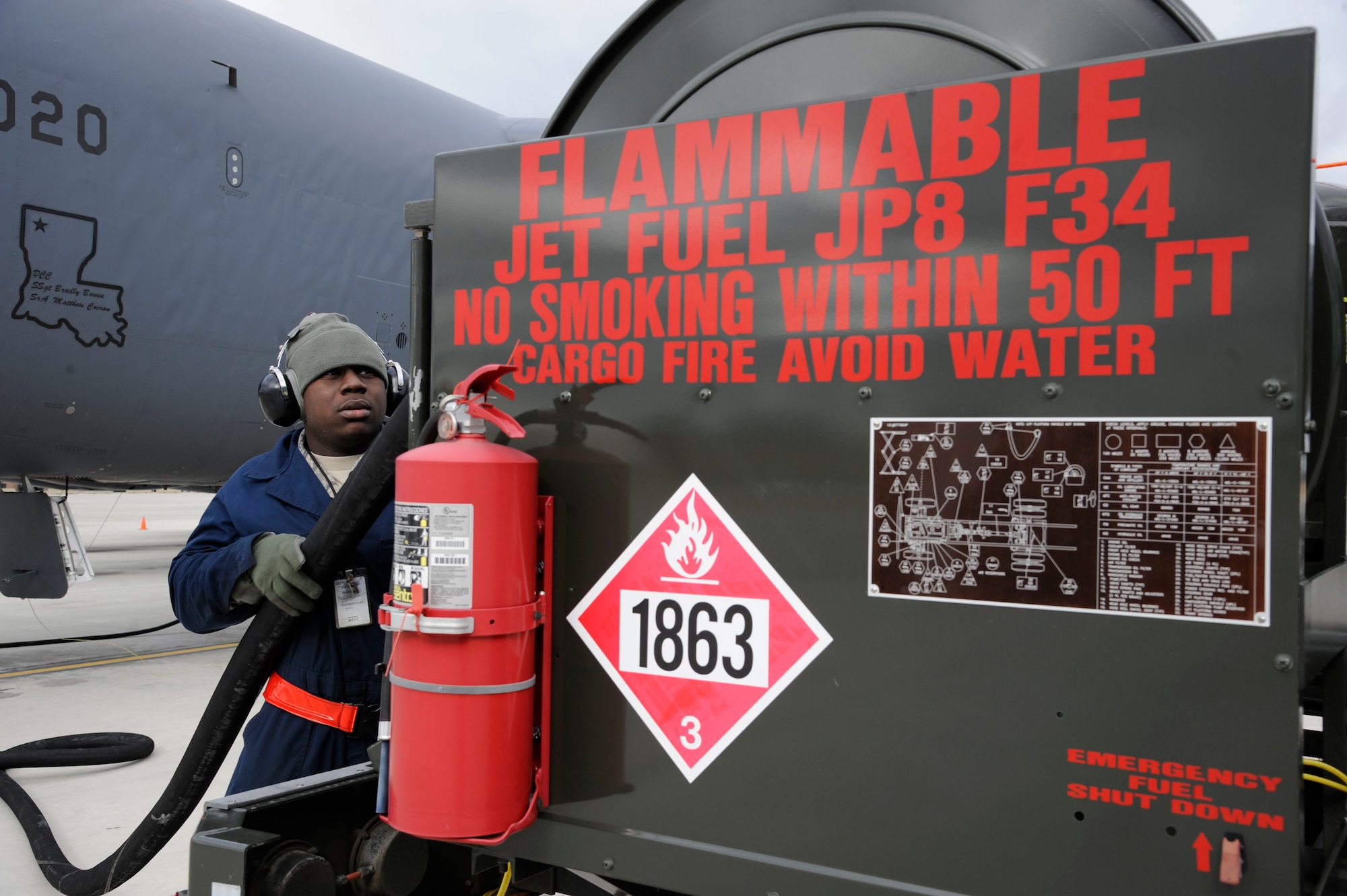Airman 1st Class Keith Jackson, 707th Maintenance Squadron crew chief, stows a fuel hose on an R-12 Hydrant Unit after refueling a B-52H Stratofortress on Barksdale Air Force Base, La., Feb. 13. B-52s can be fueled with up to 300,000 pounds of JP-8, giving them the ability to project air power from across the globe. (U.S. Air Force photo/Airman 1st Class Andrew Moua)
