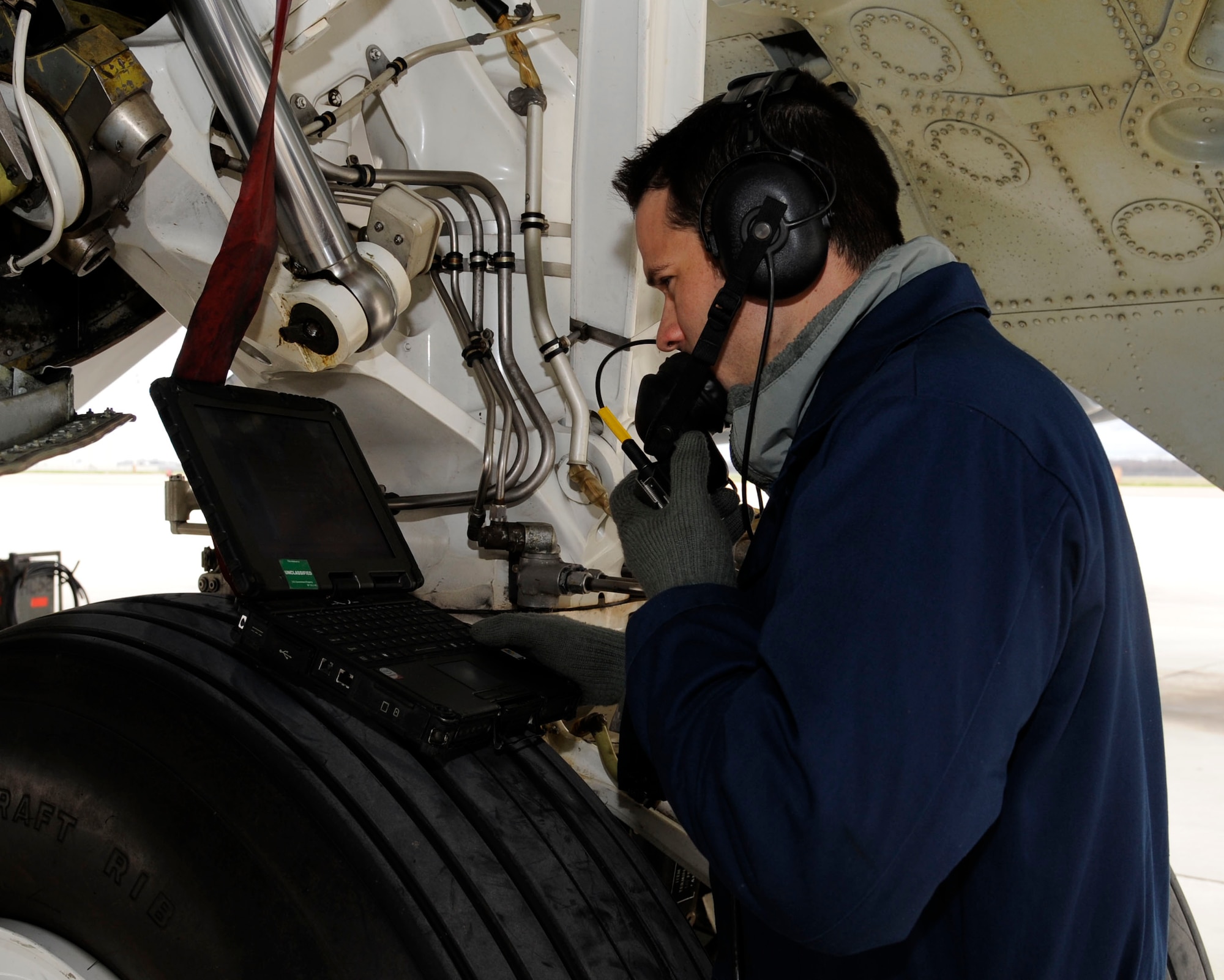 Staff Sgt. James Hulett, 20th Aircraft Maintenance Unit, reads a technical order during a refuel of a B-52H Stratofortress on Barksdale Air Force Base, La., Feb. 13. TO's are step-by-step instructional manuals maintenance Airmen use to complete specific tasks, the proper tools needed, any hazards to be aware of and protective gear to accomplish the task. (U.S. Air Force photo/Airman 1st Class Andrew Moua)