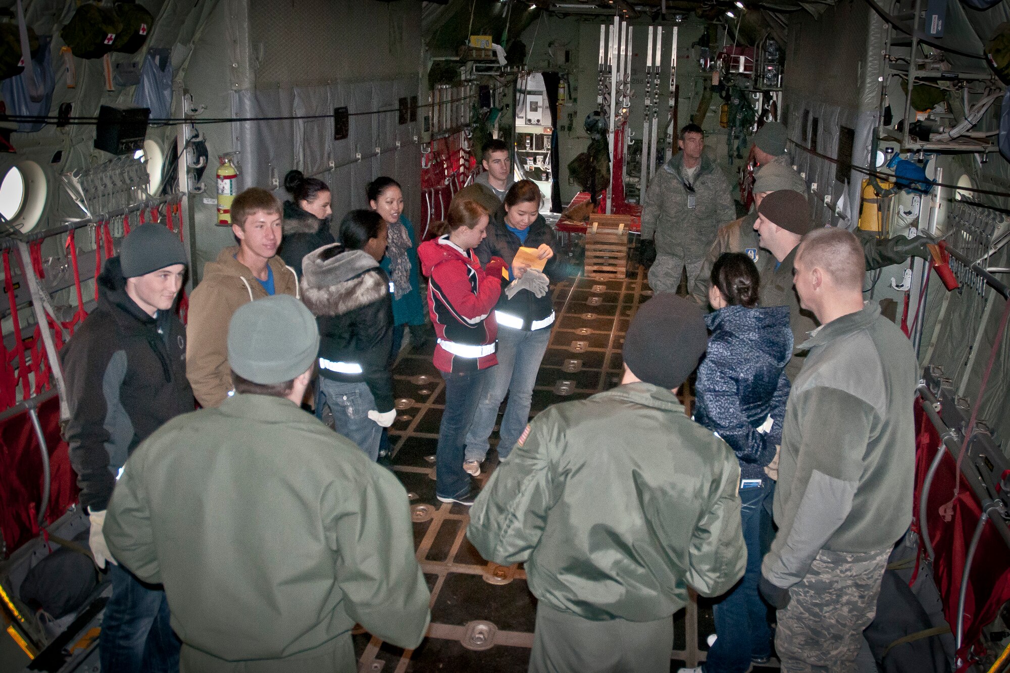 Members of the 934th Airlift Wing Development Training Flight tour a C-130 aircraft during an open house held by the 934th Operations Group at the Minneapolis-St. Paul Air Reserve Station, Minn.  (U.S. Air Force photo/Paul Zadach)