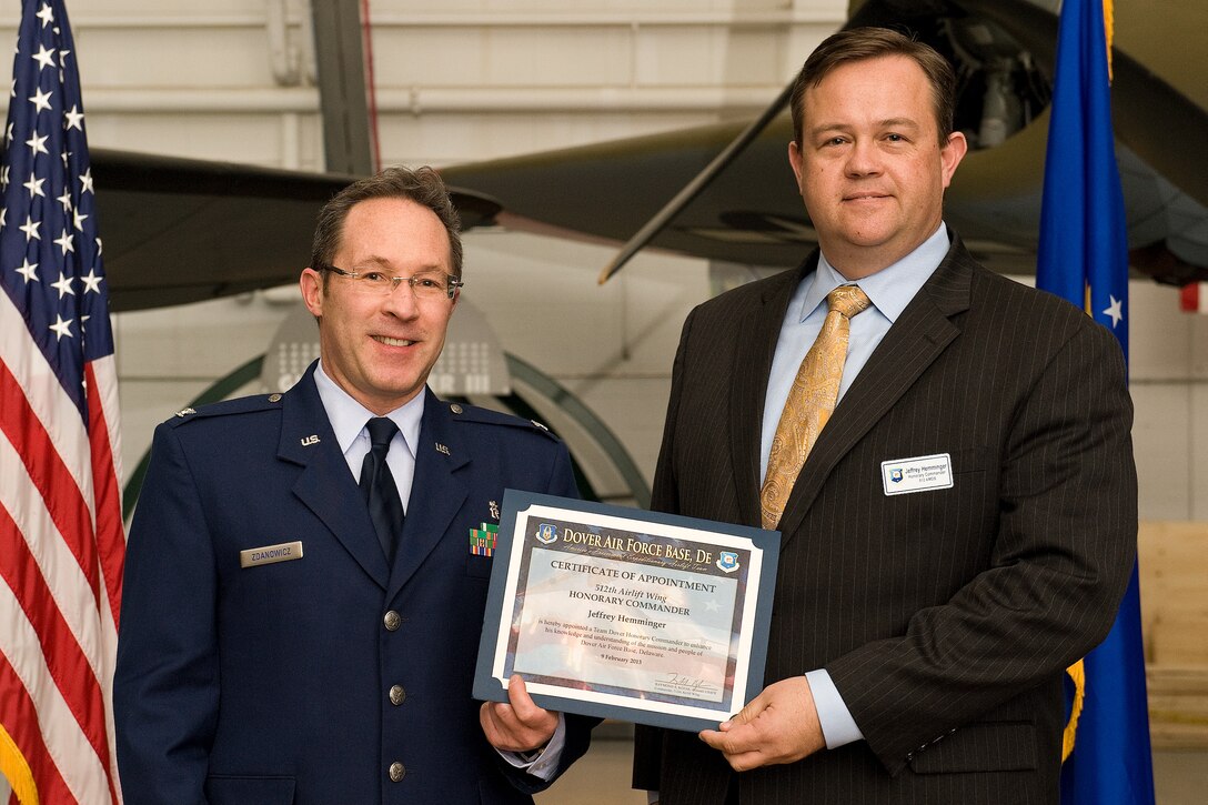 Team Dover inducted 46 honorary commanders during a ceremony and dinner Feb. 9 at the Air Mobility Command Museum, Dover, Del. The civic leaders range from elected officials and business owners to industry professionals and educators.  In addition to the 19 honorary commanders assigned to the 512th Airlift Wing, 24 are appointed to the 436th AW and one each is designated for the Joint Personal Effects Depot, Armed Forces Medical Examiner System and Air Force Mortuary Affairs Operations. (U.S. Air Force photo/Roland Balik)