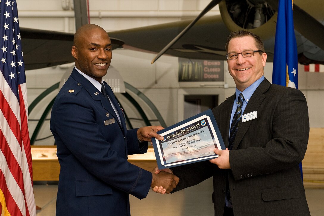 Team Dover inducted 46 honorary commanders during a ceremony and dinner Feb. 9 at the Air Mobility Command Museum, Dover, Del. The civic leaders range from elected officials and business owners to industry professionals and educators.  In addition to the 19 honorary commanders assigned to the 512th Airlift Wing, 24 are appointed to the 436th AW and one each is designated for the Joint Personal Effects Depot, Armed Forces Medical Examiner System and Air Force Mortuary Affairs Operations. (U.S. Air Force photo/Roland Balik)