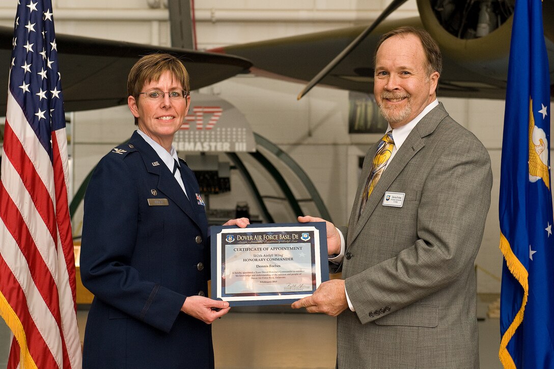 Team Dover inducted 46 honorary commanders during a ceremony and dinner Feb. 9 at the Air Mobility Command Museum, Dover, Del. The civic leaders range from elected officials and business owners to industry professionals and educators.  In addition to the 19 honorary commanders assigned to the 512th Airlift Wing, 24 are appointed to the 436th AW and one each is designated for the Joint Personal Effects Depot, Armed Forces Medical Examiner System and Air Force Mortuary Affairs Operations. (U.S. Air Force photo/Roland Balik)