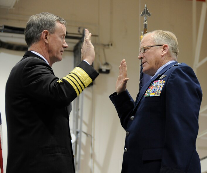 Adm. William McRaven, commander U.S. Special Operations Command, left, administer's the oath of office to Maj. Gen. Eric Weller's during Maj. Gen. Weller's promotion ceremony held at the 193rd Special Operations Wing, Middletown, Pa., Feb. 7, 2013. Maj. Gen. Weller serves as deputy commander for Mobilization and Reserve Affairs, USSOCOM and had been a commander for the 193rd SOW. (U.S. Air Force Photo by Tech. Sgt Culeen Shaffer/Released)