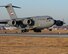 The first C-17 Globemaster aircraft delivered to the Tennessee Air National Guard's 164th Airlift Wing lands at Memphis International Airport. (U.S. Air Force photo/Tech.Sgt. Robin Olsen)




