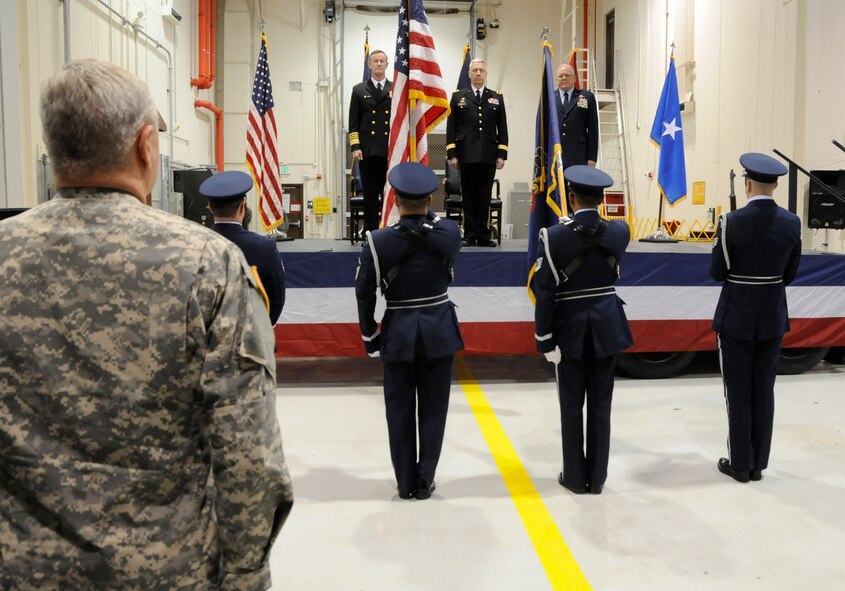 193rd Special Operations Wing Honor Guard presents the colors for Maj. Gen. Eric Weller's promotion in Middletown, Pa., Feb. 7, 2013. On stage with Maj. Gen. Weller (right) is Adm. William McRaven, commander U.S. Special Operations Command (left) and Maj. Gen. Wesley E. Craig, 51st Adjutant General of Pennsylvania (center). (U.S. Air Force Photo by Tech. Sgt Culeen Shaffer/Released)