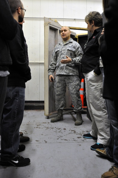 Staff Sgt. Johann Gonzalez, 55th Security Forces Squadron, explains a victim’s role during an active shooter situation to members of Leadership Sarpy during a tour on Feb. 5. (U.S. Air Force Photo by 2nd Lt. Carly Costello/Released)