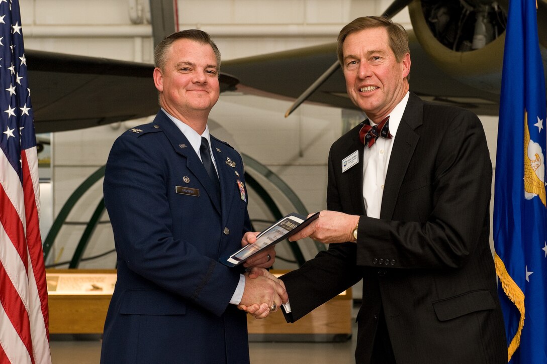 Team Dover inducted 46 honorary commanders during a ceremony and dinner Feb. 9 at the Air Mobility Command Museum, Dover, Del. The civic leaders range from elected officials and business owners to industry professionals and educators.  In addition to the 19 honorary commanders assigned to the 512th Airlift Wing, 24 are appointed to the 436th AW and one each is designated for the Joint Personal Effects Depot, Armed Forces Medical Examiner System and Air Force Mortuary Affairs Operations. (U.S. Air Force photo/Roland Balik)