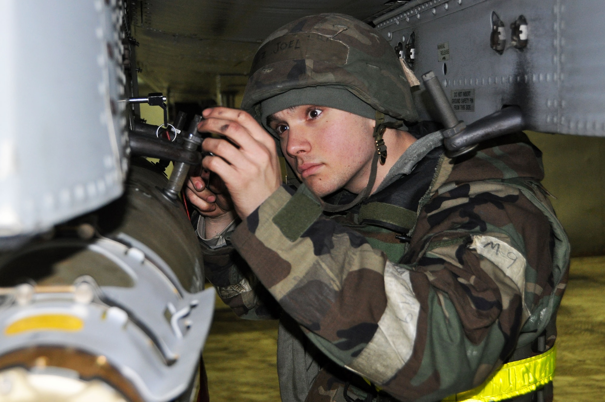 Senior Airman Joel Valdez, 51st MOS lead crew member, tights a bolt on an A-10 Thunderbolt II while conducting a half up- half down procedure during operational readiness exercise Beverly Bulldog 13-02 Feb. 13, 2013 at Osan Air Base, Republic of Korea. These exercises tests Osan Airmen’s abilities during a heightened state of readiness while providing combat ready forces for close air support, air strike control, counter air, interdiction, theater airlift, and communications in the defense of the Republic of Korea.