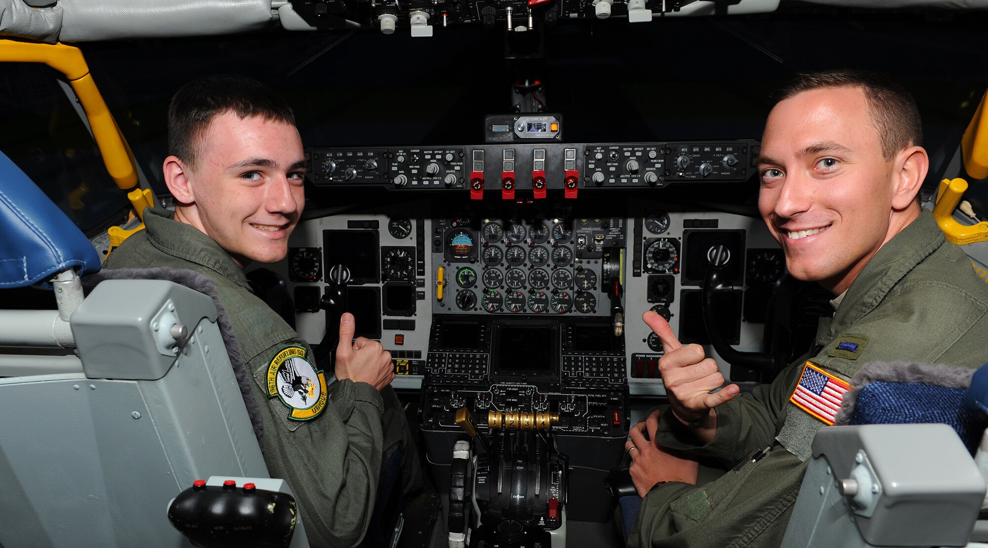 Caleb Jensen, Pilot For a Day participant, sits in the pilot seat of the KC-135 Stratotanker simulator as part of the Pilot For a Day program at Joint Base Pearl Harbor-Hickam, Hawaii, Feb. 8, 2013. Caleb was recently diagnosed and treated for aplastic anemia, a condition which causes the body to stop producing new blood cells. After being diagnosed with the condition, Caleb was recommended for the 15th Wing supported private organization which aims to benefit children in the local community suffering from serious or chronic illnesses. (U.S. Air Force photo/Tech. Sgt. Jerome S. Tayborn)