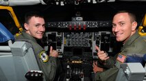 Caleb Jensen, Pilot For a Day participant, sits in the pilot seat of the KC-135 Stratotanker simulator as part of the Pilot For a Day program at Joint Base Pearl Harbor-Hickam, Hawaii, Feb. 8, 2013. Caleb was recently diagnosed and treated for aplastic anemia, a condition which causes the body to stop producing new blood cells. After being diagnosed with the condition, Caleb was recommended for the 15th Wing supported private organization which aims to benefit children in the local community suffering from serious or chronic illnesses. (U.S. Air Force photo/Tech. Sgt. Jerome S. Tayborn)