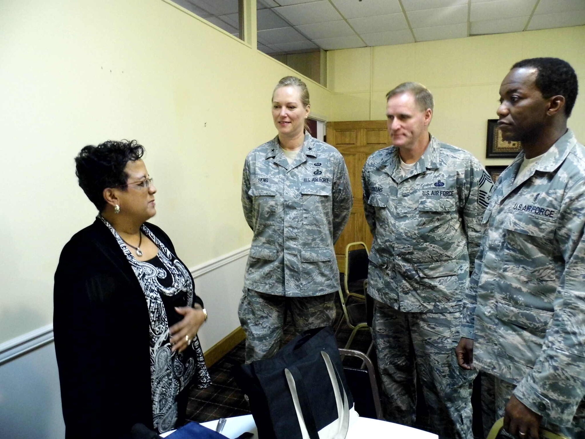 Stacia Robinson discusses networking with U.S. Air Force Brig. Gen Jocelyn Seng of Washington, D.C., Chief Master Sgt. Carl Collins of Florence, Ala., and Chief Master Sgt. Lawrence Kirby, of Philadelphia. (Courtesy photo)