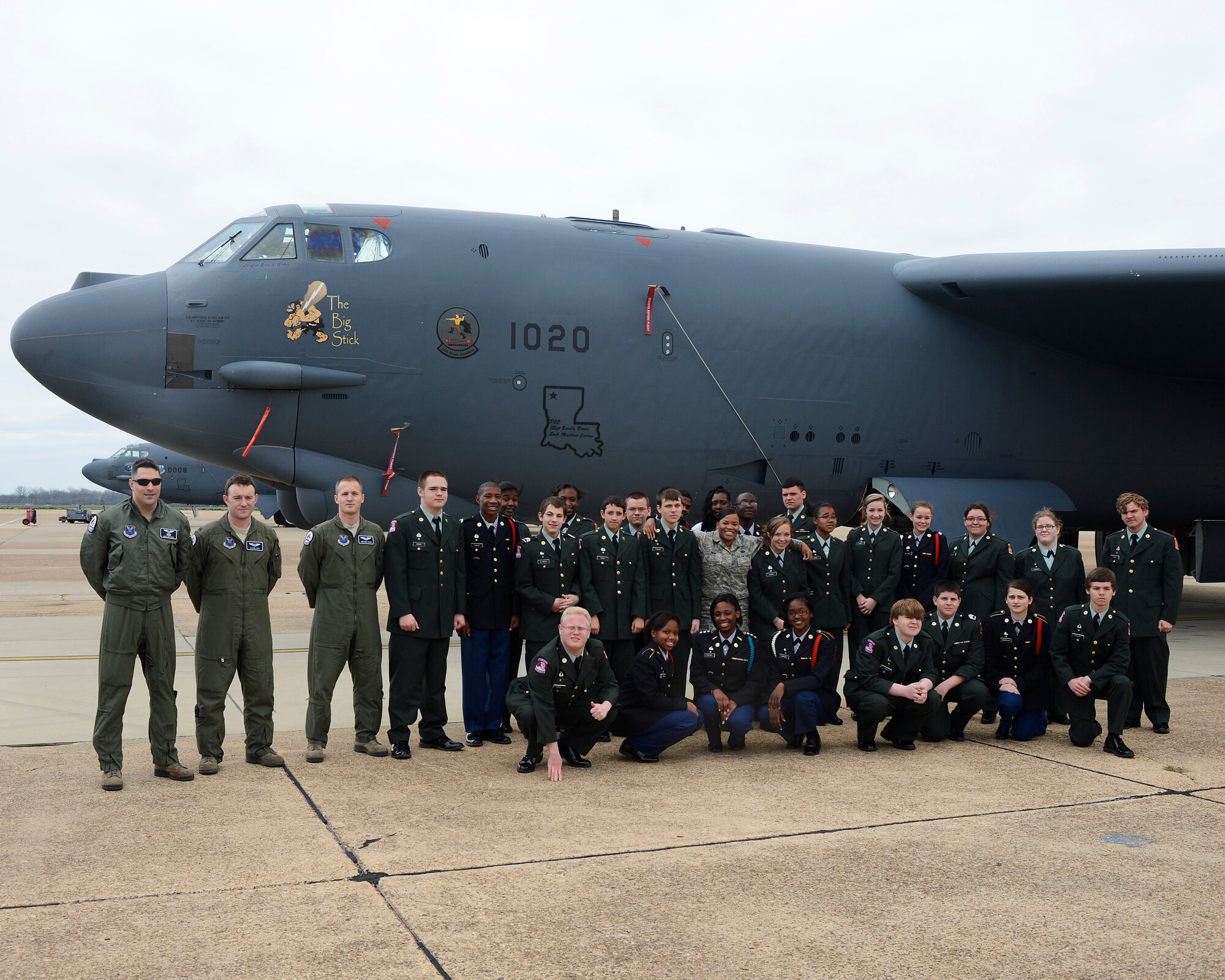 Junior Reserve Officer Training Corps cadets from North Desoto High School, La., pose with B-52H Stratofortress aircrew members during a base tour on Barksdale Air Force Base, La., Feb. 8. The Barksdale Community Relations program regularly hosts base tours to educate interested groups on the mission and history of the base. (U.S. Air Force photo/Staff Sgt. Chad Warren)