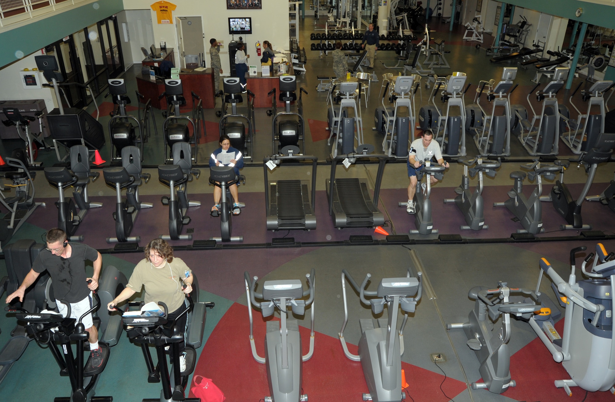 Fitness Center patrons work out Tuesday at 8:30 a.m. on base. Scott AFB was selected as a test base for 24-hour Fitness Center access. (U.S. Air Force photo/Staff Sgt. Stephenie Wade)